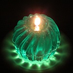 Flammenfoto Spiralkugelkerzen transparent Smaragd